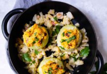 Deftiger Veggie-Klassiker: Geschmorter Kohlrabi mit Käse-Polenta-Füllung, Foto: Deli/Walter Rau. Bild erhalten von Punkt PR, Katharina Fugmann